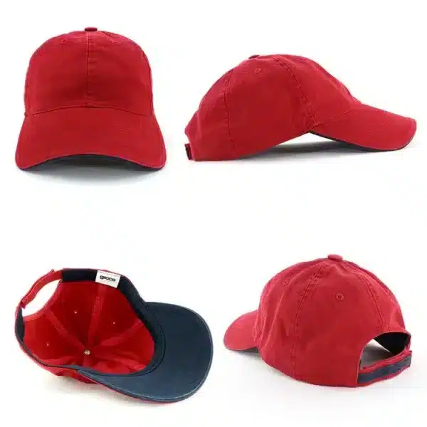 A red enzyme washed cap with a curved brim, featuring a branding logo on the side.