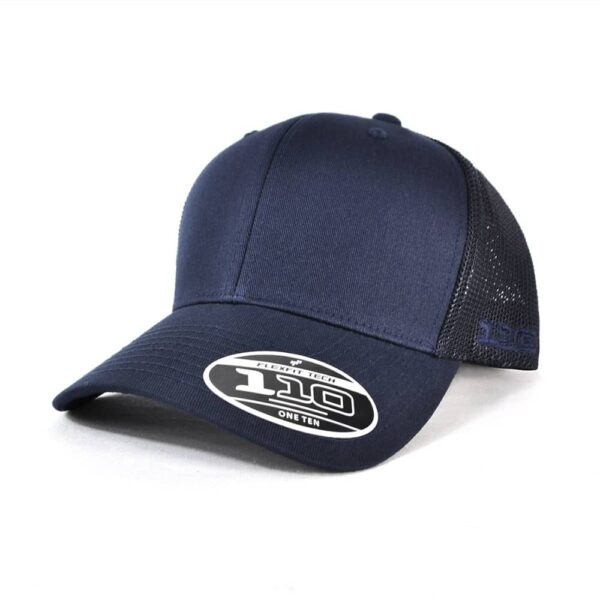 A navy trucker cap featuring mesh sides and a branded logo, designed as the FLEXFIT 110 headwear.