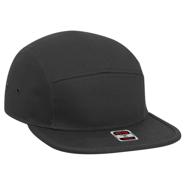 A black 5-panel camper hat featuring a branded label and a structured crown.