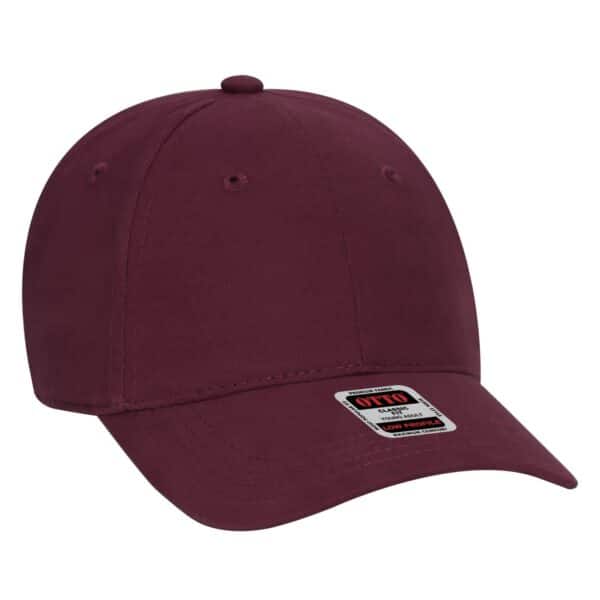 A burgundy 6-panel baseball cap with a branded tag on the front.