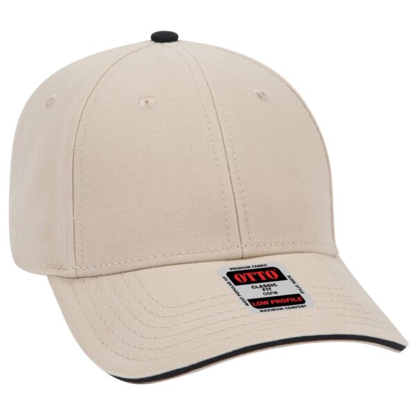 A beige 6-panel baseball cap with a low profile and a black peak. Features a logo or branding tag.