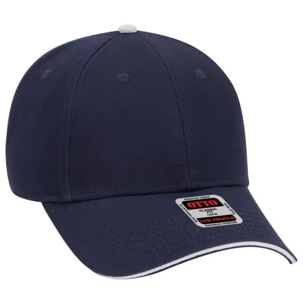A navy blue 6 panel baseball cap with a curved brim and a small white button on top, featuring a branding logo.