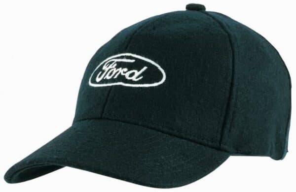 A green Melton wool cap featuring an embroidered logo on the front. The cap has a classic baseball style.