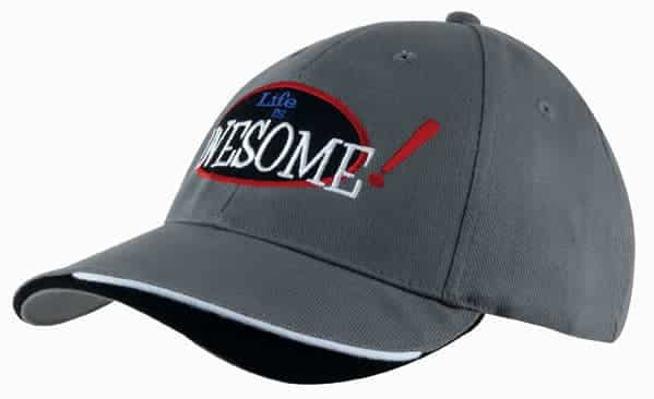 A grey brushed cotton cap with an indented peak and a logo featuring the word "AWESOME!" in bold lettering.