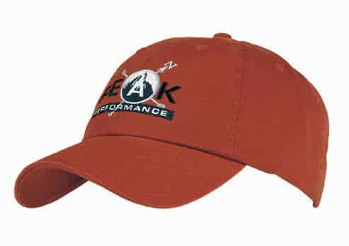 A washed chino twill cap in rust orange with a logo on the front. Featuring a curved brim and adjustable strap.
