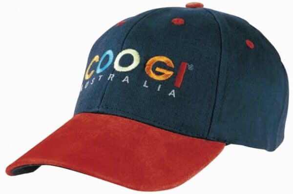A navy cap with a suede peak in rust, featuring a logo on the front.