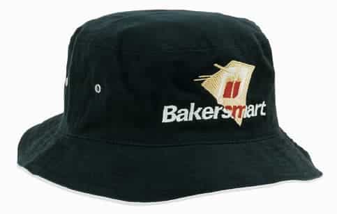 A black brushed sports twill bucket hat featuring a logo. It has a wide brim and a classic design.