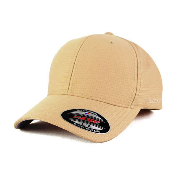 A tan Flexfit cap featuring a structured design and a contrasting logo on the side.