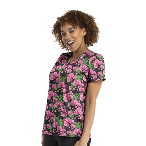 A floral printed curved V-neck top featuring pink flowers on a black background, with a logo.