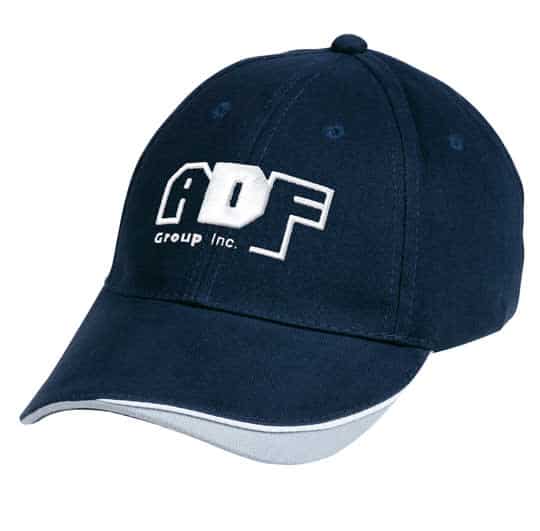 A navy cap with a white logo, featuring a curved peak and contrast stitching.
