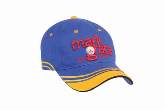 A blue and yellow cap with an embroidered logo and decorative stitching.
