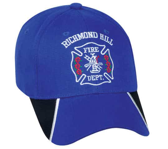 A blue cap featuring an embroidered fire department logo. It has a black visor and white detailing.