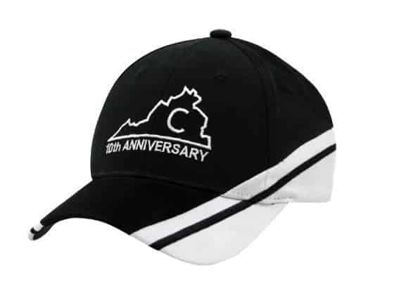 A black and white cap with a logo and text indicating a 10th anniversary.