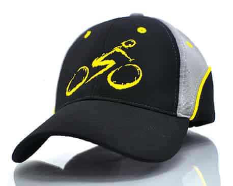 A black and grey cap featuring a yellow logo of a cyclist. The cap includes a logo on the front.