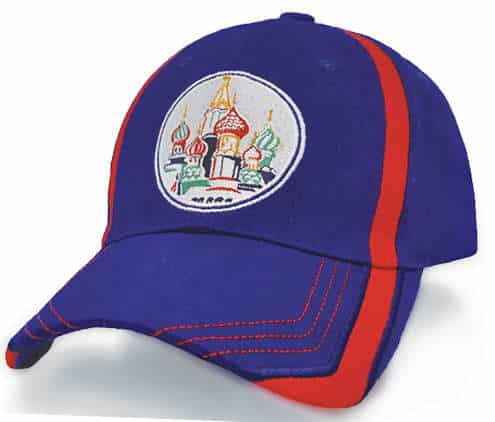 A blue cap with red accents and a circular logo featuring an architectural design.