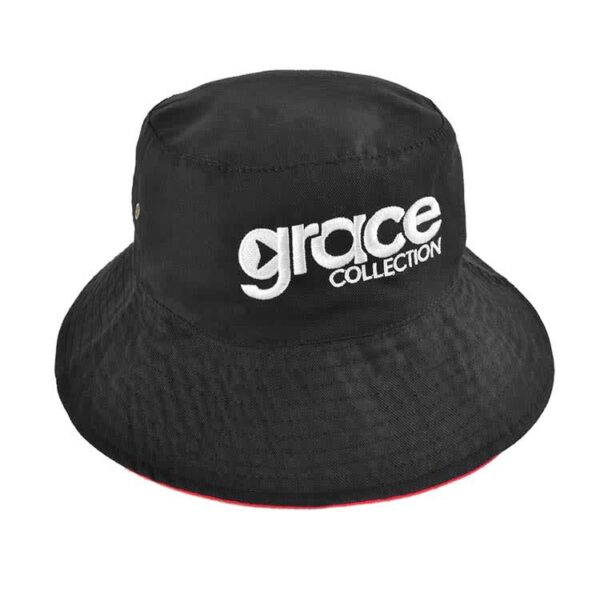 A reversible bucket hat in black with an adjustable toggle and a logo on the front.
