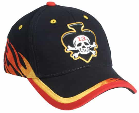 A black cap with a skull and crossbones logo, featuring red and yellow accents and tiger stripe design on the sides.