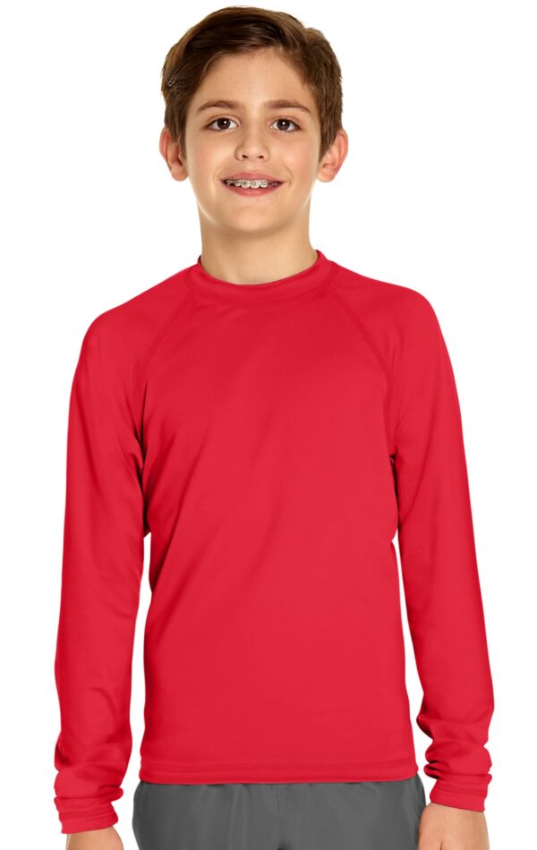 A red youth long sleeve rash guard with UPF 50+ protection. Features a logo on the garment.