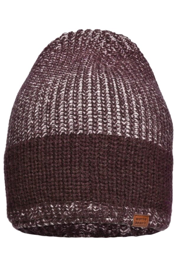A knitted hat in shades of dark purple and brown, featuring a textured design and a small logo tag.