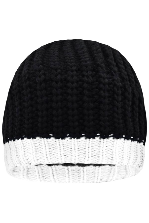 A beanie hat featuring a black knitted design with a white ribbed cuff. The product has a logo.