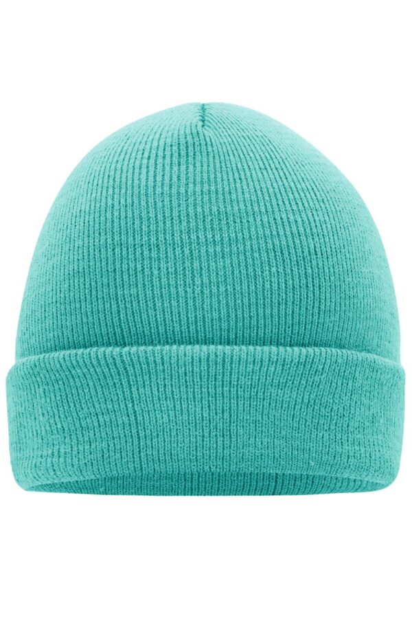 A knitted cap in a vibrant turquoise colour with a rolled cuff design and a textured finish.