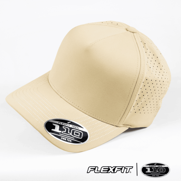 A beige cap with perforations, featuring a curved brim and a logo on the front.