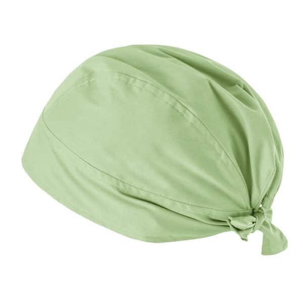 A light green bandana with ties at the back, featuring a smooth fabric and a simple design. It has a logo.