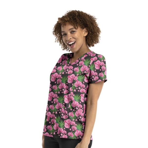 A floral printed curved V-neck top featuring pink flowers on a black background, with a logo.