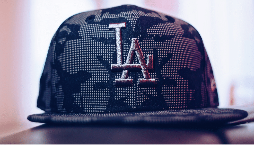 Fine detail of embroidered logo on a snapback cap