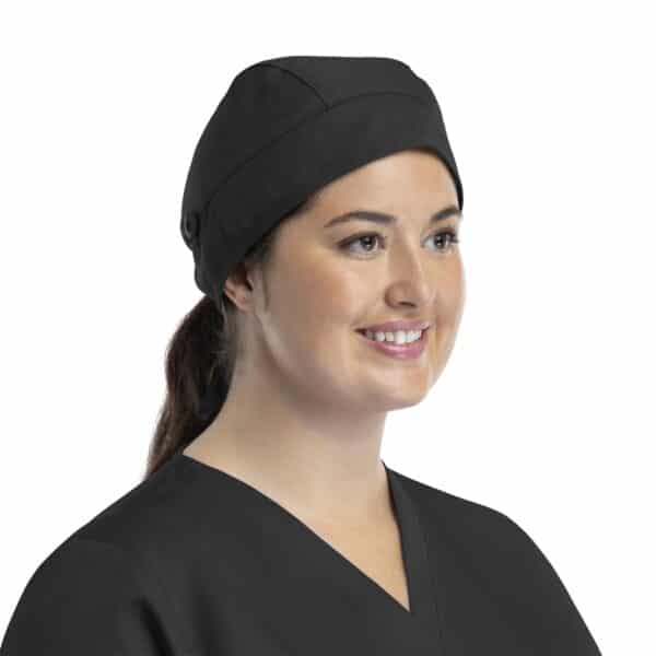 A black cap with a button worn by a smiling woman, featuring a sleek design suitable for professional settings.