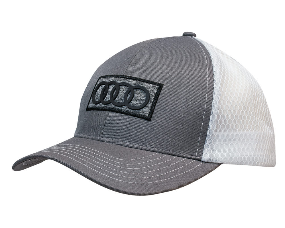 A grey cap with a mesh back featuring a logo on the front. The design includes a curved brim.