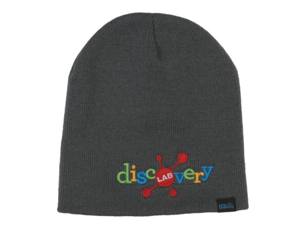 A grey beanie with a colourful embroidered logo featuring the word "discovery" and a circular design.