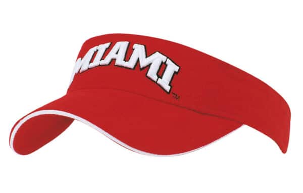 A red cotton visor with a white trim and a logo on the front.